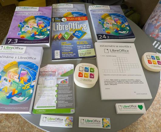 Books and stickers from the booth
