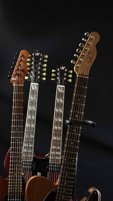 3 guitars fretboards