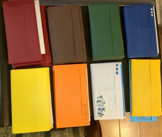 Photo of a bunch of stacks of Papr prototypes on various colors.

Photo by, SelfDugGrave 